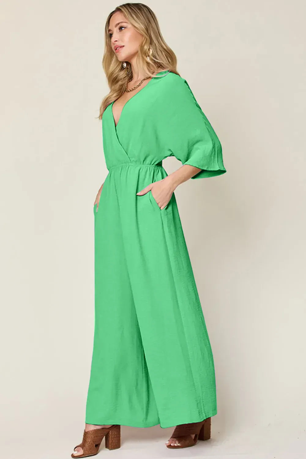 Double Take Full Size Surplice Wide Leg Jumpsuit with Pockets Double Take Full Size Surplice Wide Leg Jumpsuit with Pockets