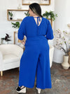 Double Take Full Size Surplice Wide Leg Jumpsuit with Pockets Double Take Full Size Surplice Wide Leg Jumpsuit with Pockets